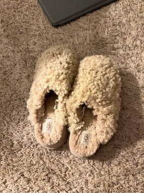 UGG Fluffy Shearling Slip-On Mules in Light Beige